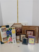 assortment of pictures, frames and photo albums