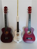 2 guitars and ukulele