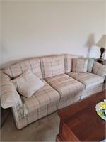 3 seat pink strip pattern couch
