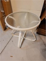 Set of two smaller glass top side tables