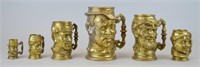 Group of Antique Brass Toby Mugs