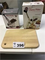 2 CHERRY PITTERS, CUTTING BOARD