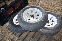 3 trailer rims and tires