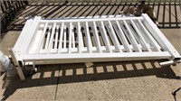White poly fence sections: approximately 6' long