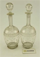 Lot #614 - Pair of star decorated decanter