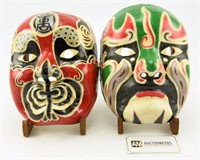 Lot #615 - (2) paper mache tribal painted masks
