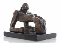 Modern Bronze Sculpture of Man Resting on Arms