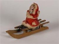 Wax Face Santa on sled