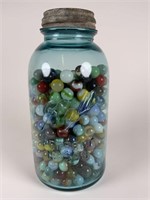 Marbles in large blue mason jar