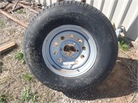 16" trailer tire and rim, 6 bolt, nearly new.