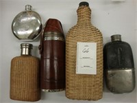 Five old flasks.