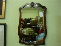 TOC burled Queen Anne wall mirror.