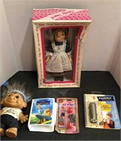 Shirley Temple Doll,  harmonica book, jacks, lion