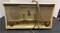 Olympic Radio/alarm clock model 555
Tested has