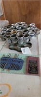 Group of Small thimbles and metal stand and
