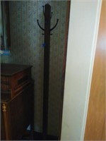 Wood coat rack about 69in. tall, base is about