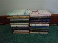 Lot of 19 hardcover quilting books.
