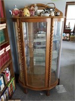 Glass cabinet. Key present. Nice condition.
