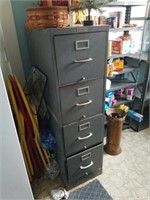 Hone 4 drawer filing cabinet. Full of sewing