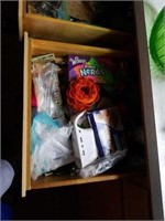 Two drawers of kitchen items.