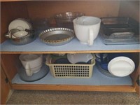 Lot of kitchen bowls and items.