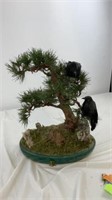 TREE AND CROW STATUE