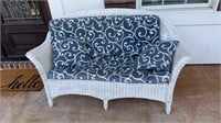 White Wicker Loveseat. Approximately 58 inches