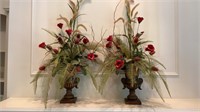 Pair of decorative vases with arrangements