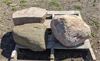 Three medium landscaping boulders