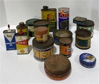Various vintage grease cans including Puritan and