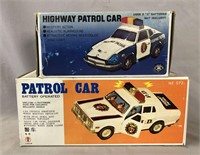 Lot of Two Battery Operated Police Cars Boxed.