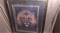 Framed lion print artwork