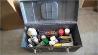 Grey tool box with various assorted items.