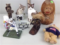 Coconut monkey bank, football figurine, cat