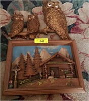 CARVED OWLS AND BASRELIEF LOG CABIN