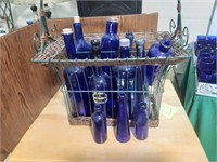 Blue cobalt glass wine and liquor bottles