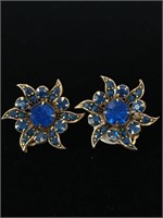 PR OF BLUE AND GOLD FLOWER CLIP ON EARRINGS;
