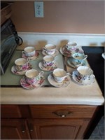 9 TEA CUPS AND SAUCERS