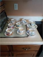 8 TEA CUPS AND SAUCERS