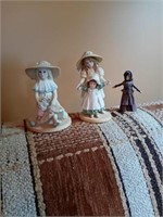 2 PORCELAIN FIGURINES AND 1 STRAW ONE