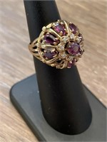 14k Gold Ring set with Rubies size 4.5 weighs