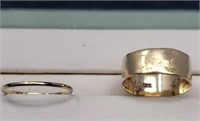 2 Gold Rings.  Thin band is 10KT gold. Wider band