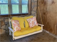 White Porch Swing with Yellow Cushions