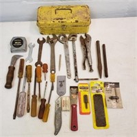 Yellow metal tool box with tools
