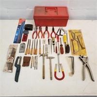 Red plastic tool box with tools