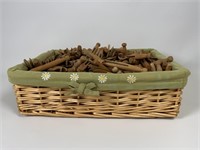 Wooden clothespins in basket