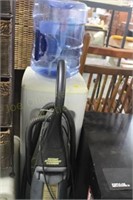 Water Cooler & Eureka Steam Rug Cleaner