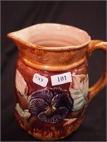 7" majolica serving pitcher decorated with pansies