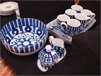 12 pieces of Dansk blue and white pottery: