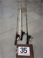 3 fishing poles w/ reels